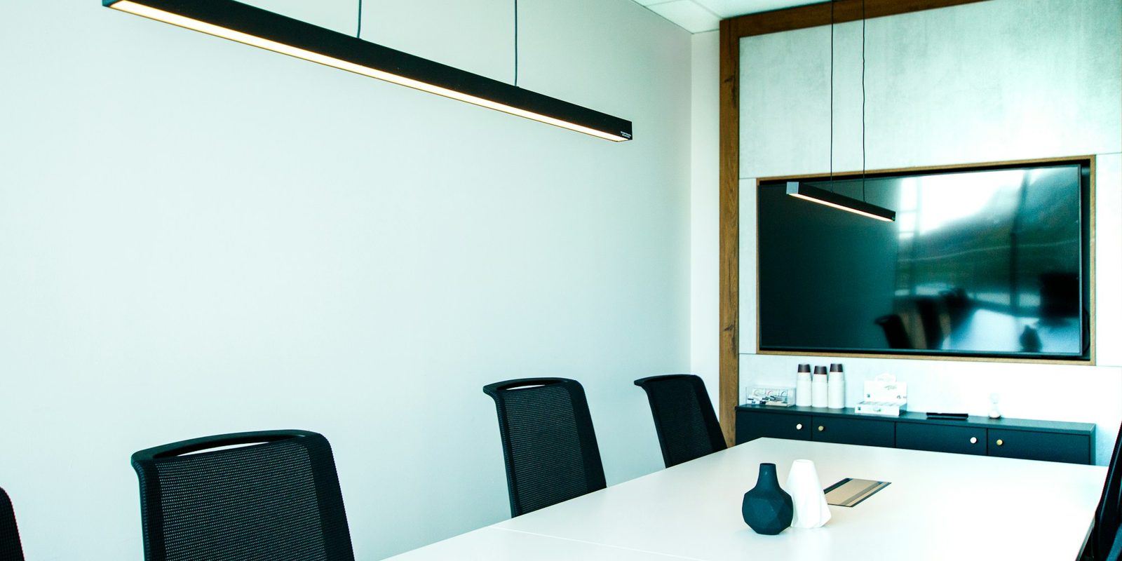 An empty boardroom table.